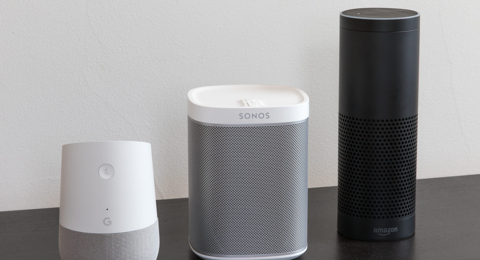 Smart speakers, such as those from Google, Sonos, and Amazon shown here, can be welcome participants in your connected home. But keep them updated with the latest security patches. Image: Digitized House Media.