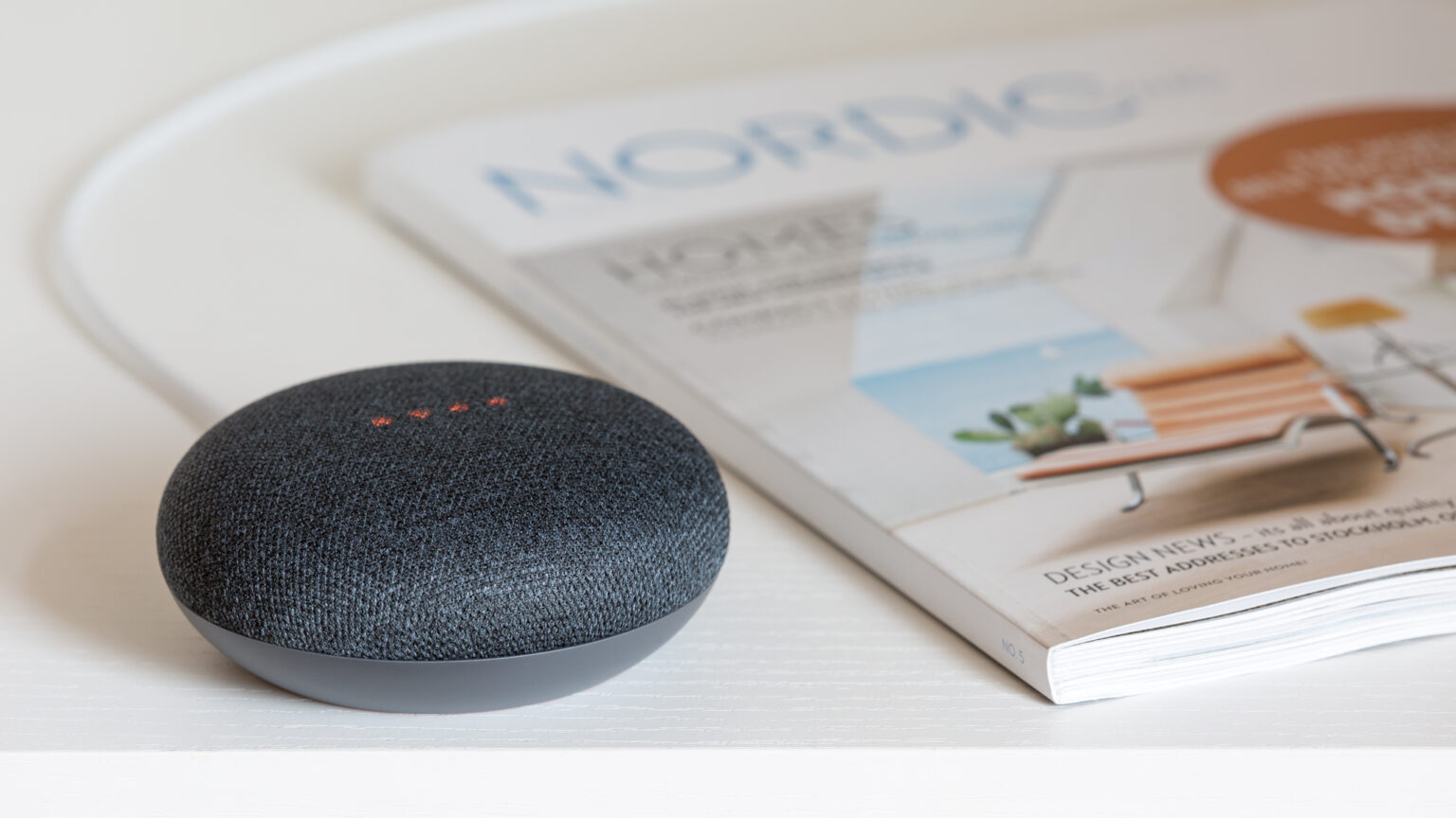 The Google Home Mini speaker offers broad voice activation compatibility with Nest and Works with Nest products. Image: Digitized House Media.