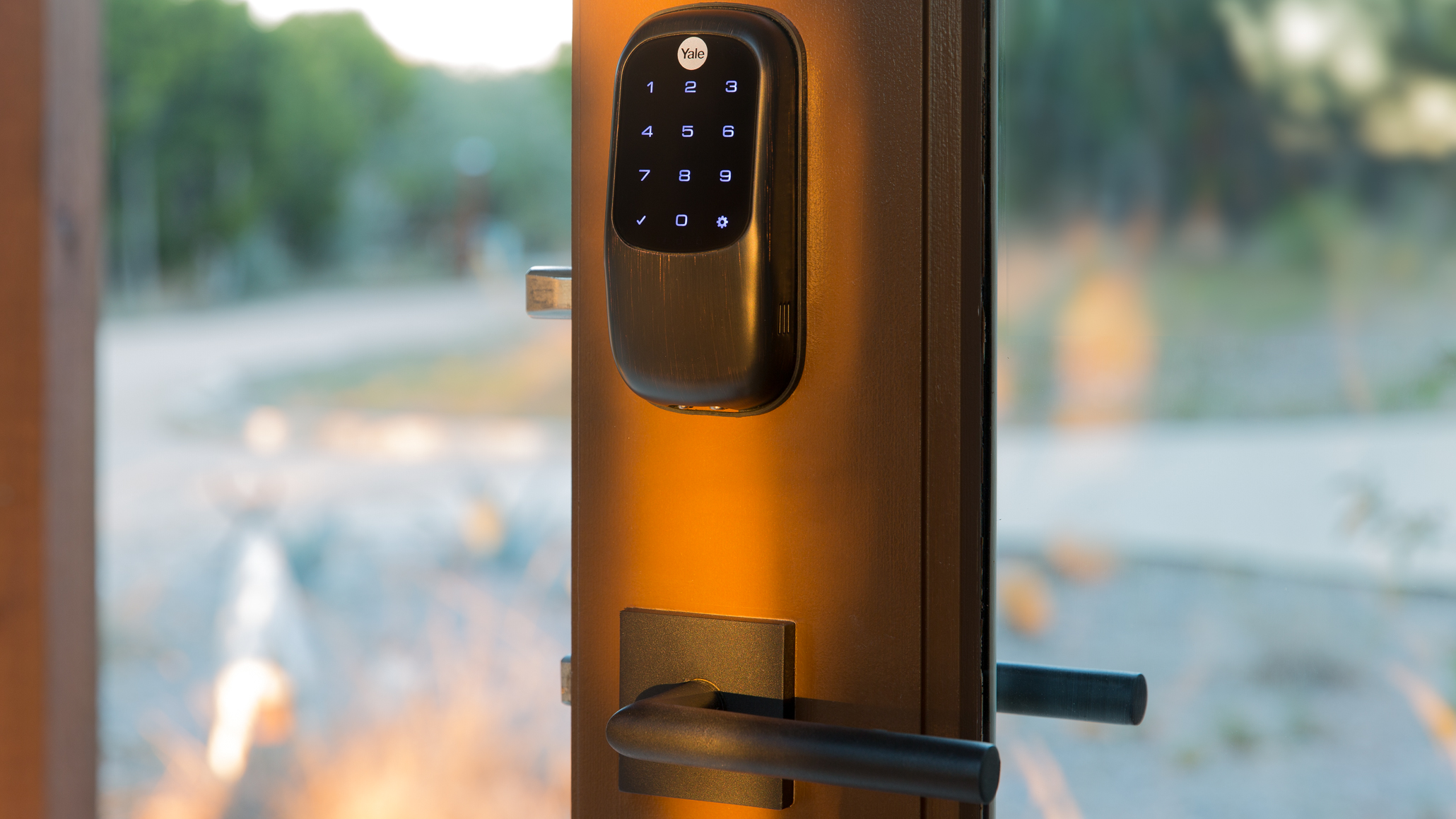 Smart door locks combine safety with convenience, and are a popular place to start with upgrading your home to a smart home. This Yale Assure lock is keyless, and offers shareable digital keys, a touchscreen for PIN code entry, and integration with many home automation and security systems. Image: Digitized House Media.