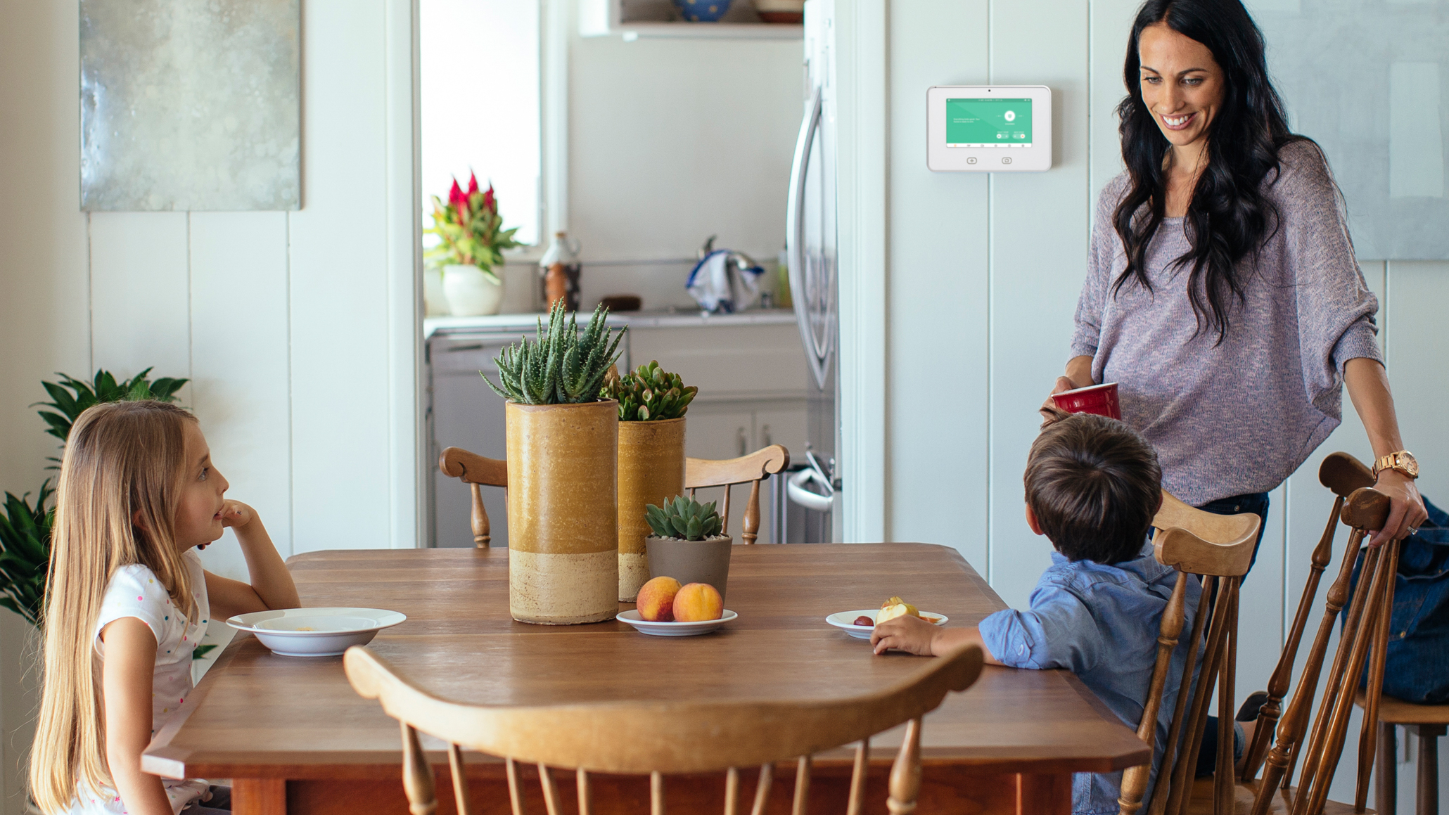 Energy-saving smart home technology has become more appealing to the female consumer, further driving the normalization of efficient living. Image: Vivint.