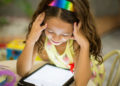 Kids are immersed in smart tech, and its up to parents to help them safely navigate through it. Image: Patricia Prudente on Unsplash.