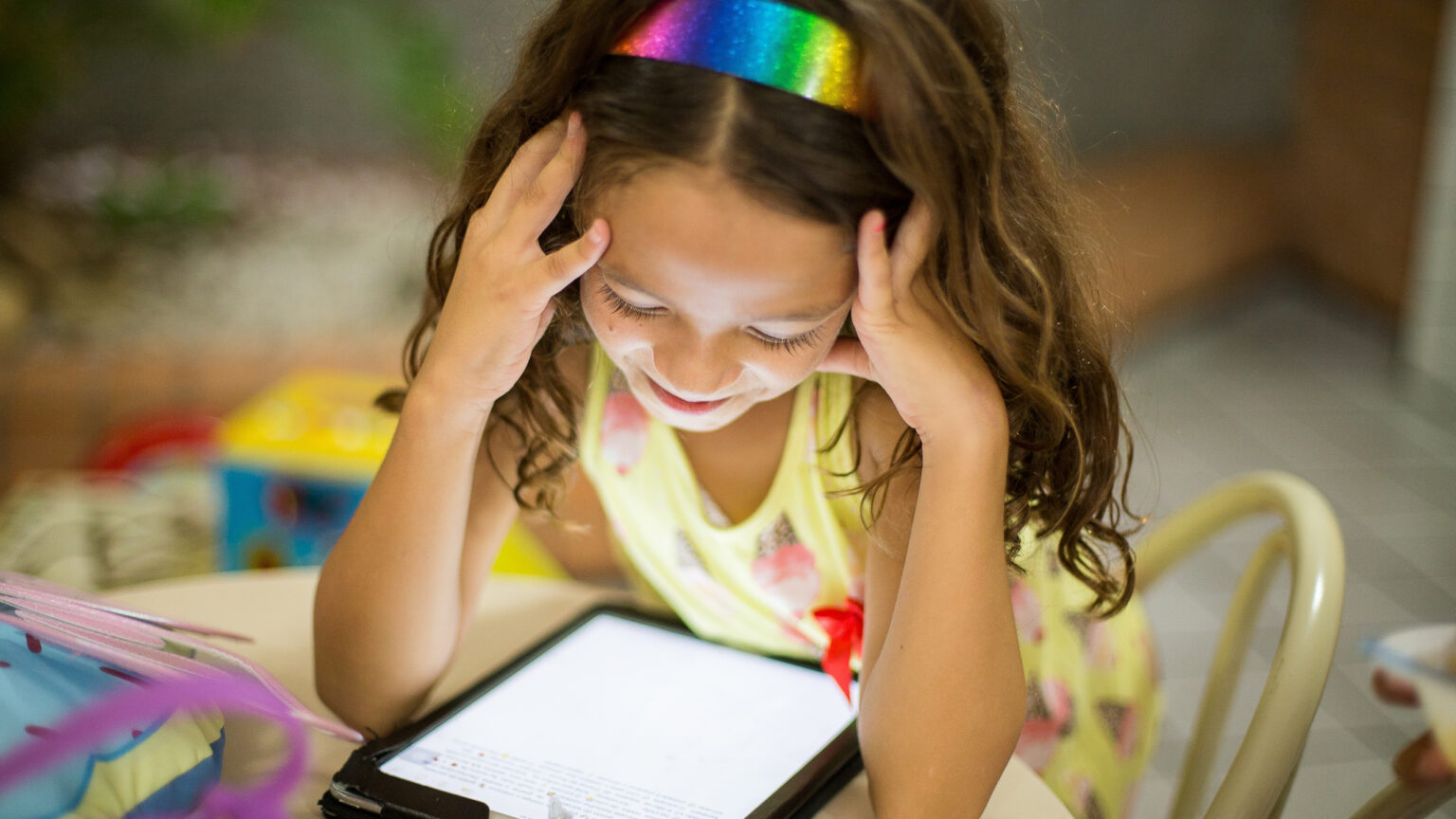 Kids are immersed in smart tech, and its up to parents to help them safely navigate through it. Image: Patricia Prudente on Unsplash.