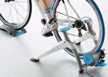 Looking to smarten your workouts? The Tacx Flow Smart Indoor Bike Trainer connects with smartphone apps while it simulates a cycling experience. Image: Tacx.