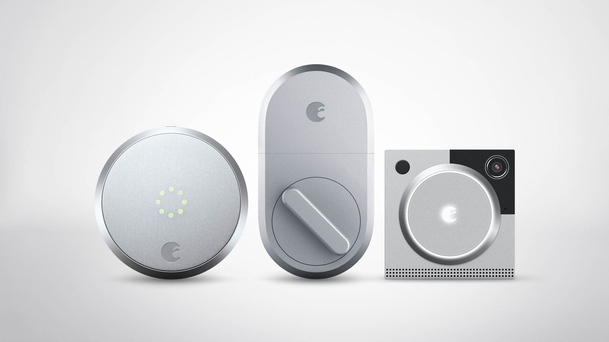 Smart locks from August (left and center) are designed to replace the interior portion of a standard deadbolt. On right, an August smart doorbell. Image: August Home.