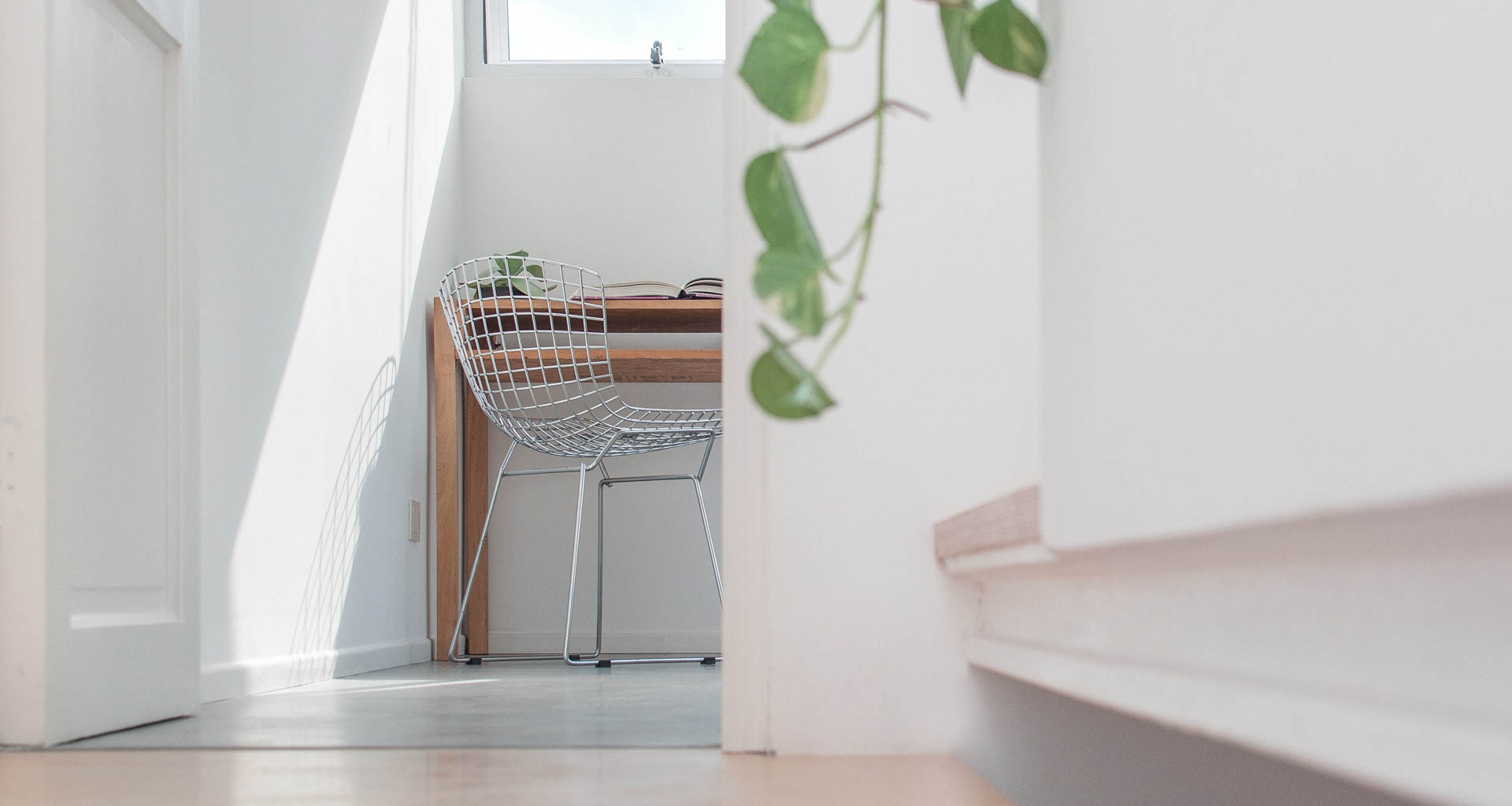 Tucking a small desk into a corner of a spare room may be just the ticket for office space in your home. Image: Angelique Emonet on Unsplash.