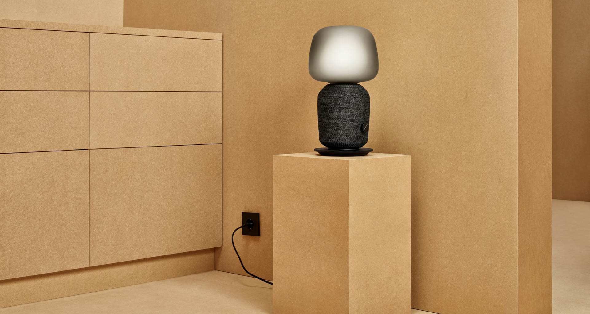 The combination table lamp and speaker product has a single power cord. Image: IKEA.