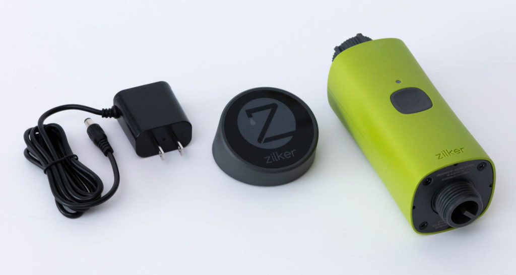 A Zilker Starter Kit out of its box. Here (left to right) are a bridge power adapter/cable, Zilker Bridge, and Zilker Valve. Image: Digitized House.