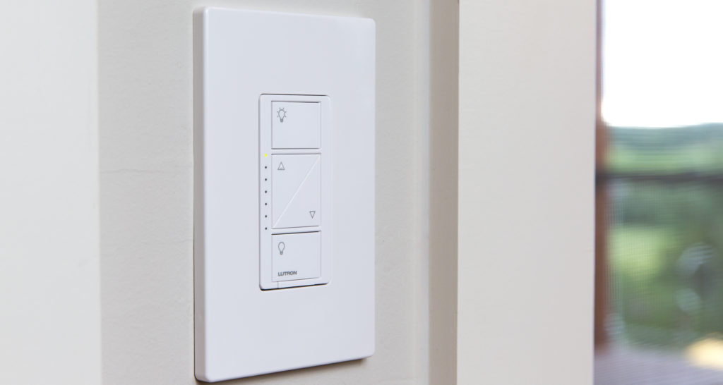 Smart lighting control can obviate the need to touch potentially virus-contaminated light switches. In the case of this in-wall Lutron Caséta wall control, the connected lighting fixtures can be controlled with an app or voice control. Image: Digitized House.