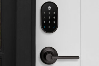 Next x Yale smart door lock in black suede. Image: Yale.